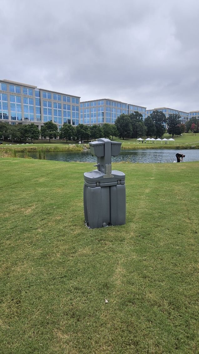 Portable restroom unit portable unit setup maintained by Grand Restrooms for Carolina sites