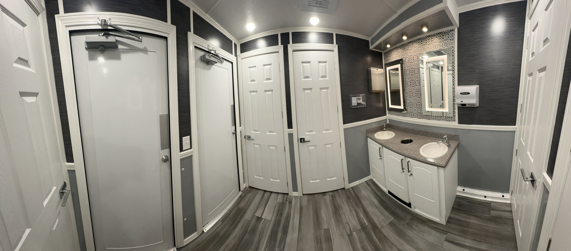 Luxury restroom interior ceiling detail providing climate-controlled hospitality for Carolina events