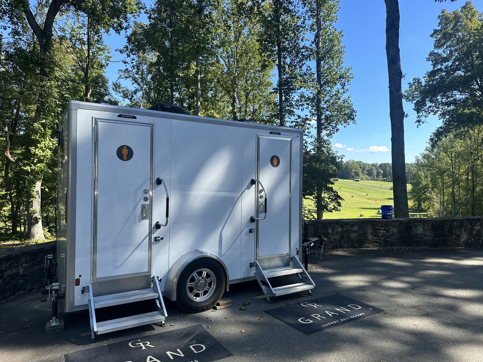Portable restroom unit s large event setup maintained by Grand Restrooms for Carolina construction sites and festivals