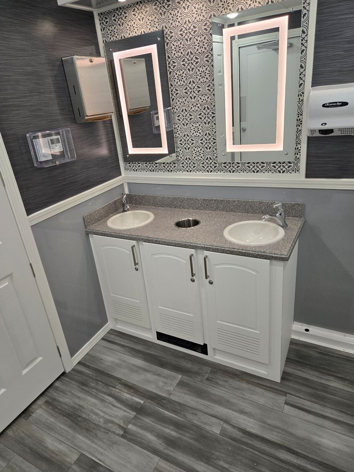 Restroom interior detail highlighting Grand Restrooms luxury trailer finishes for Carolina events